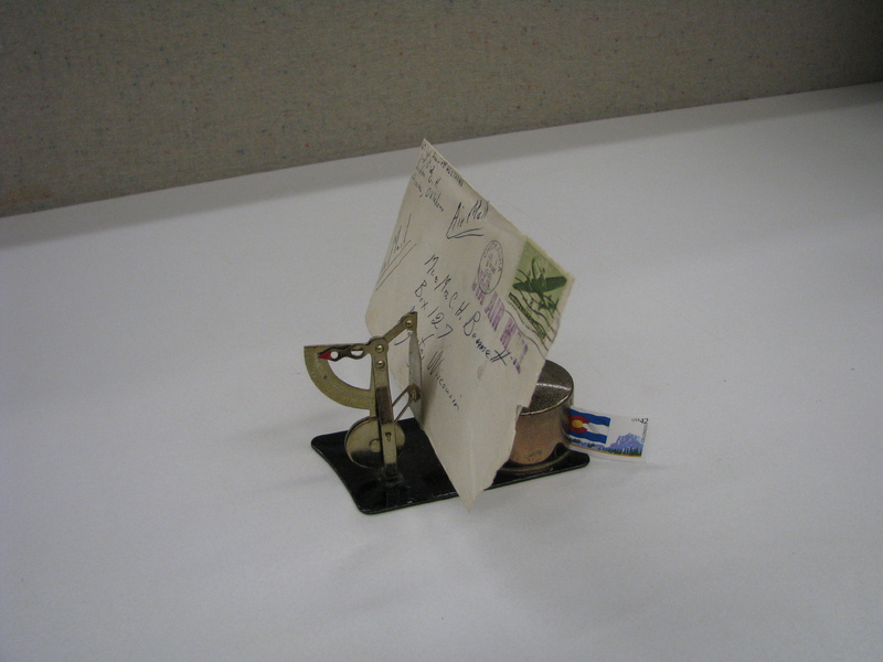 Letter scale and stamp dispenser