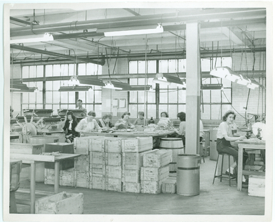 women helping with war production